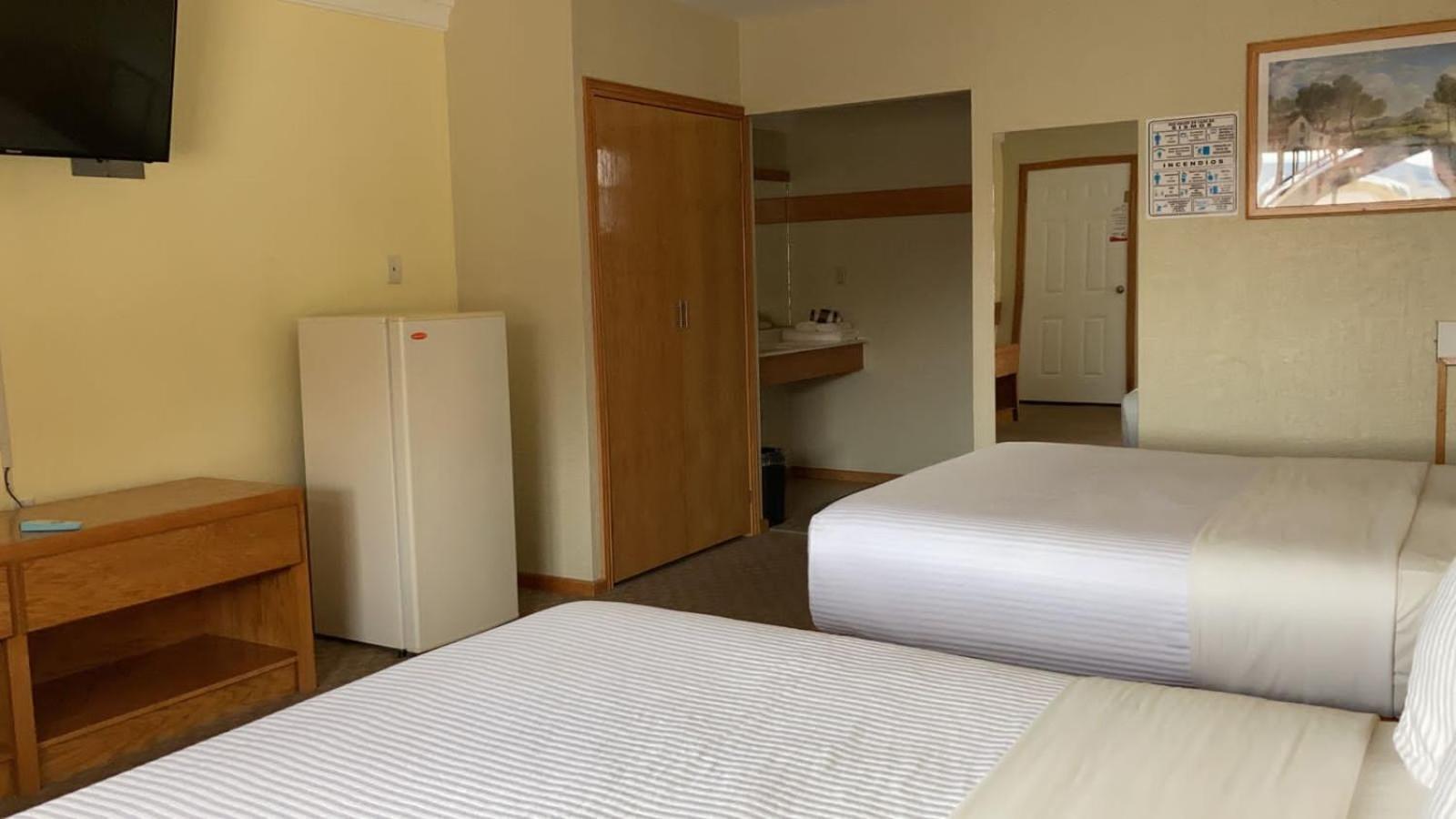 La Huerta Inn & Suites Cuauhtémoc الغرفة الصورة